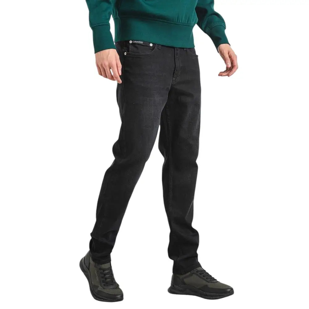 Calvin Klein jeans: sort slim fit sorte med subtil fading på lårene