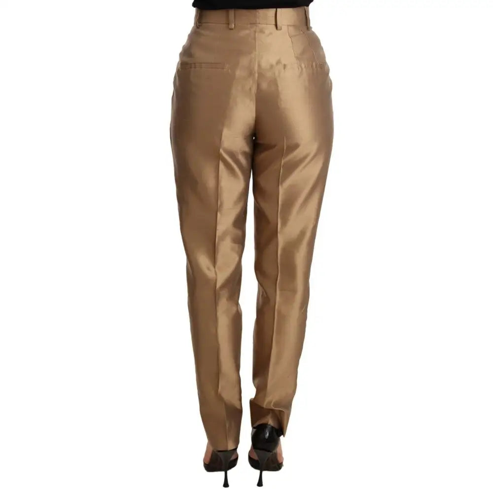 Dolce & Gabbana Elegant Tapered Silk Trousers in Gold