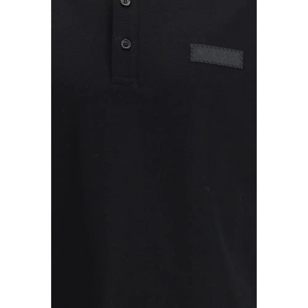 Givenchy sort bomuldspolo med sølvknapper og tekstureret etiket. Outlet mærkevarer, spar 30-70%