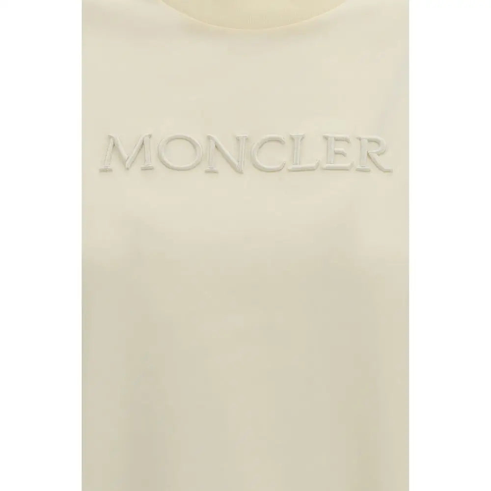 Oplev det ultimative Moncler’s beige bomulds t-shirt med subtilt logo