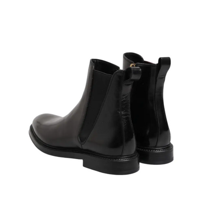 Dolce & Gabbana gabbana black chelsea black chelsea leather mid calf boots med blank patentlæder og elastiksidepaneler
