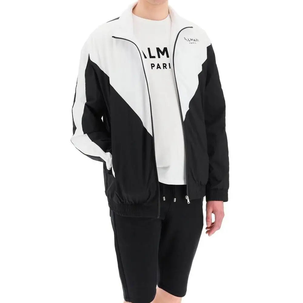 Balmain sorte polyamid shell jacket med diagonale paneler og lynlås
