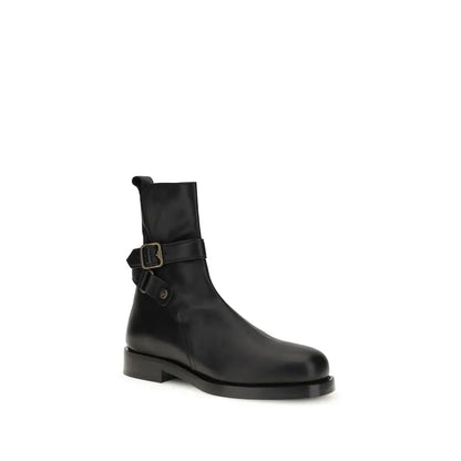 Burberry black calf leather Bos Taurus ankle boots with buckle and heel