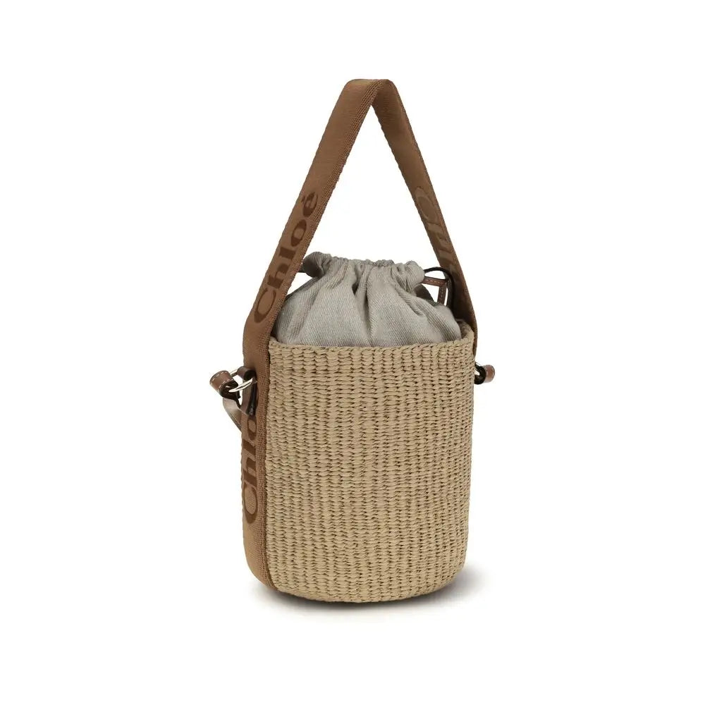 Chloé beige raffia bucket bag med brunt skulderbånd og logo