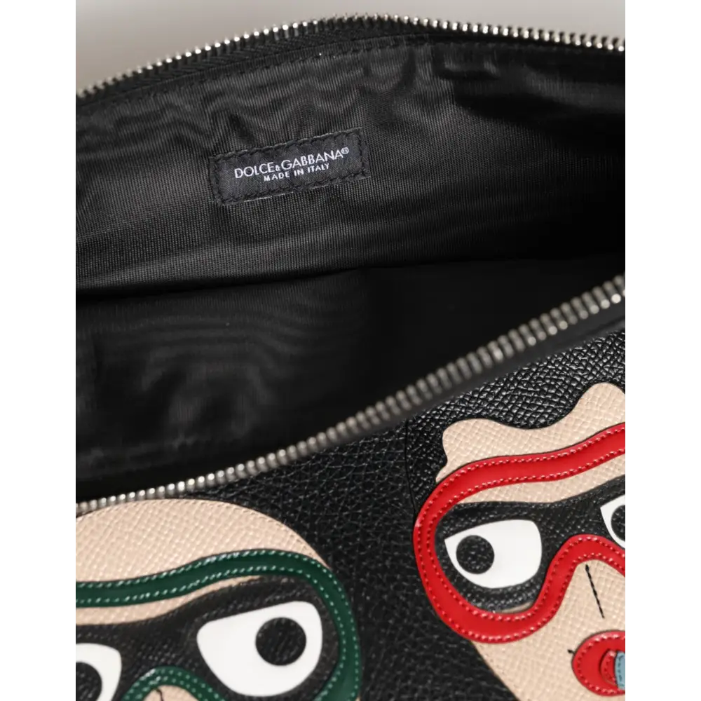 Sort Dolce & Gabbana clutch i sort læder med tegneserieansigter og farverige briller