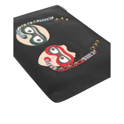 Dolce & Gabbana black leather clutch med to cartoon ansigter