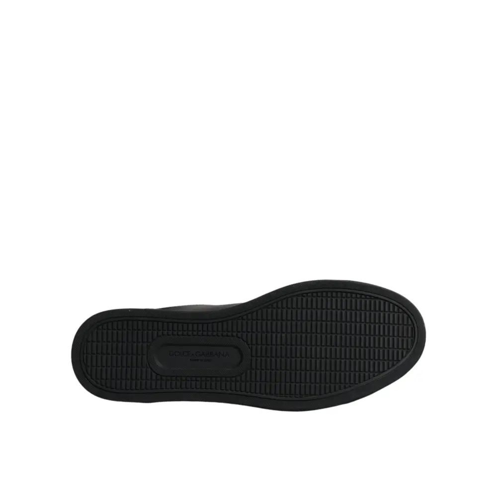 Dolce & Gabbana black London sacred heart sneakers with embossed logo on textured rubber sole