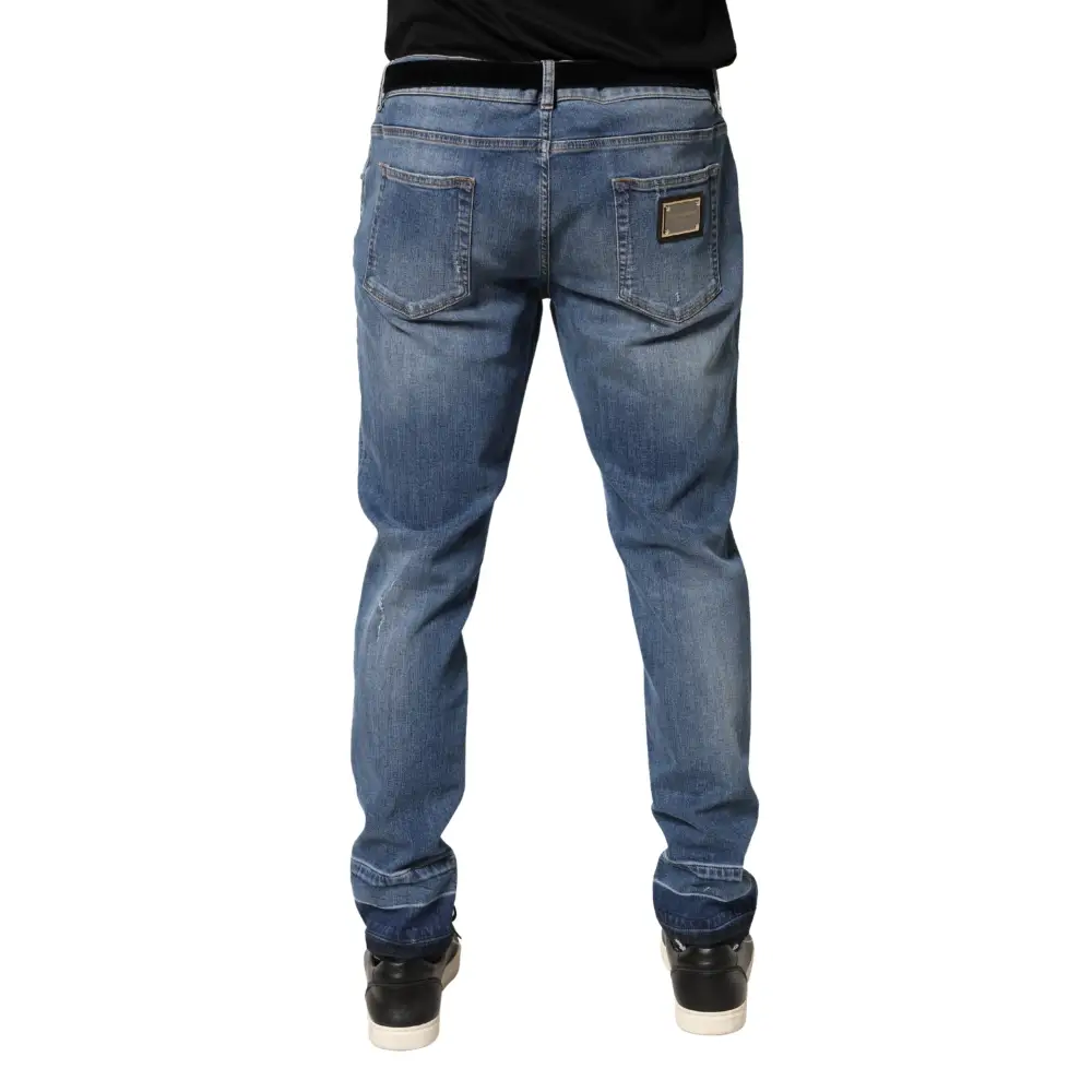 Dolce & Gabbana blue tattered skinny cotton denim jeans with faded wash and gold-tone patch