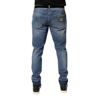 Dolce & Gabbana blue tattered skinny cotton denim jeans with faded wash and gold-tone patch