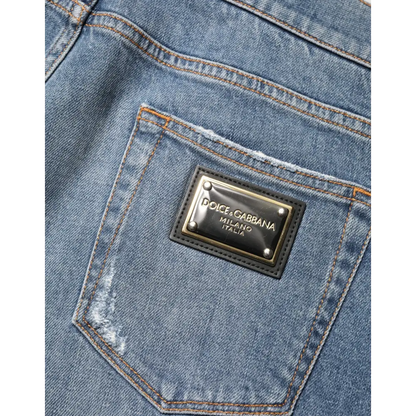Dolce & Gabbana blue tattered slim fit jeans med sort læderpatch og guldtekst