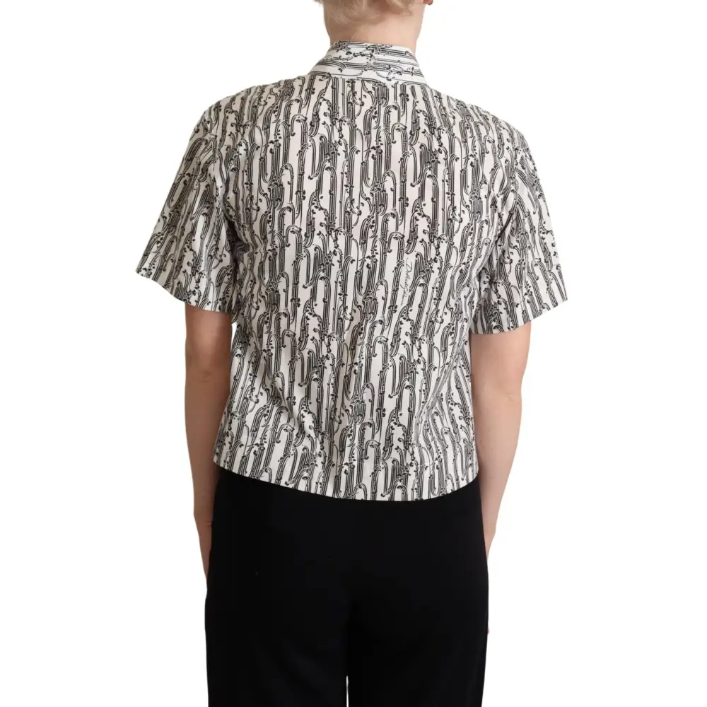 Dolce & Gabbana elegant floral cotton polo med musikalske mønstre