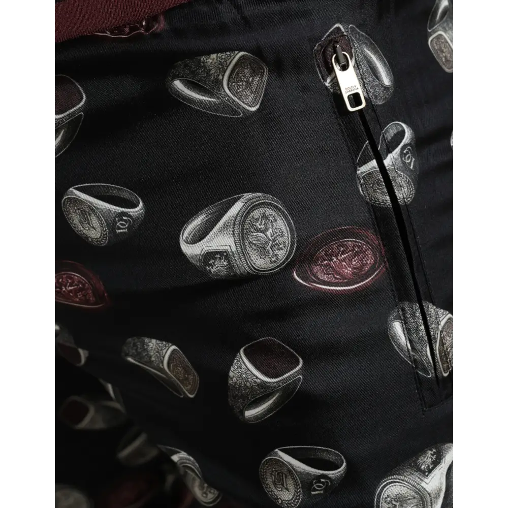 Dolce & Gabbana Elegant Silk Jogging Trousers with Ring Print - IT50/L - Bukser