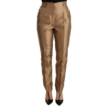 Dolce & Gabbana Elegant Tapered Silk Trousers in Gold