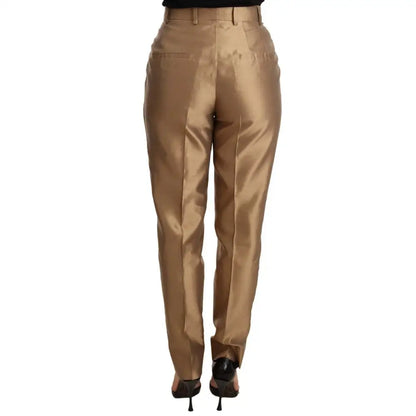 Dolce & Gabbana Elegant Tapered Silk Trousers in Gold