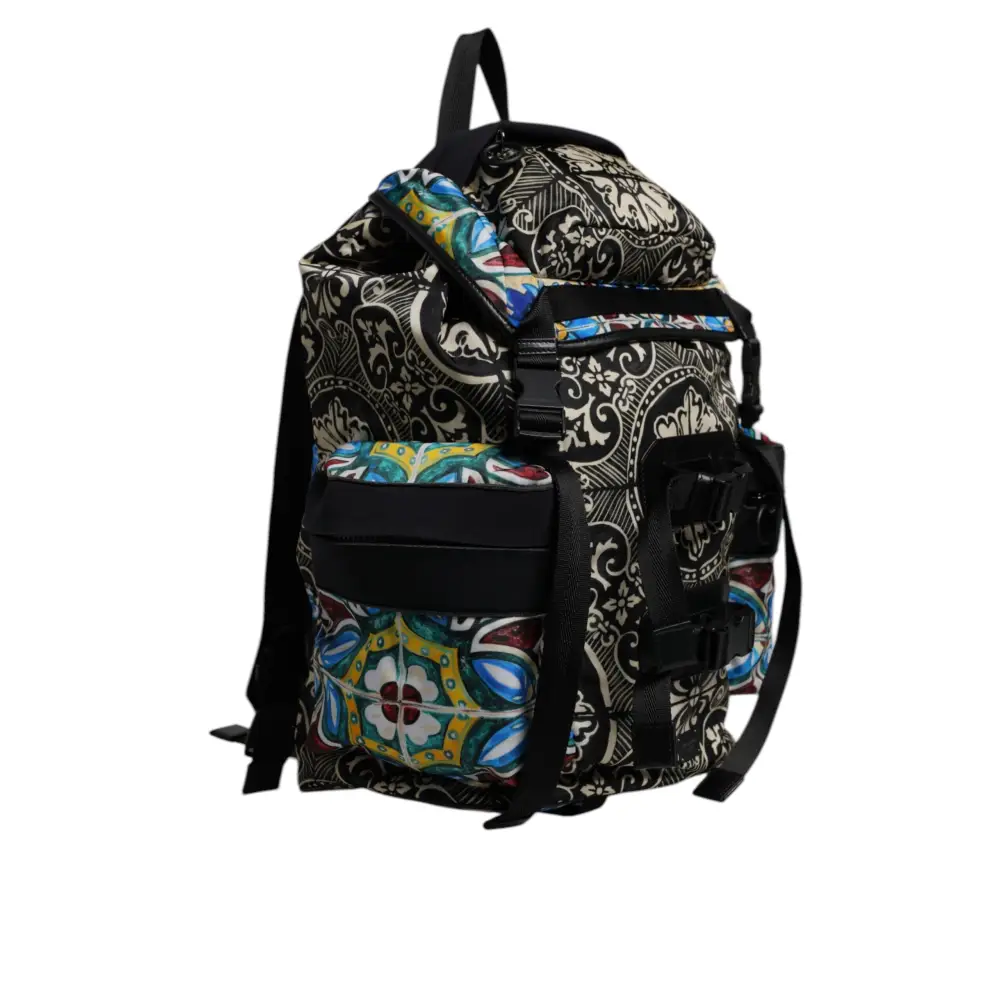 Vibrant Dolce & Gabbana multicolor maiolica print nylon backpack with bold black and white designs accented by colorful floral motifs in blue, green, yellow, and red