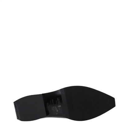 Love Moschino black leather clogs with Moschino branding on heel