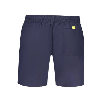 Navy blue polyamide swimwear shorts with yellow tag on back pocket